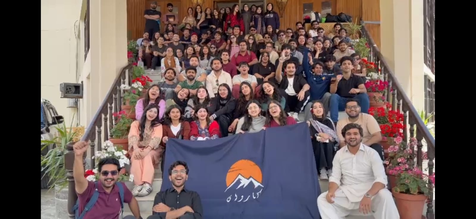 Karvaan group with the Karvaan flag